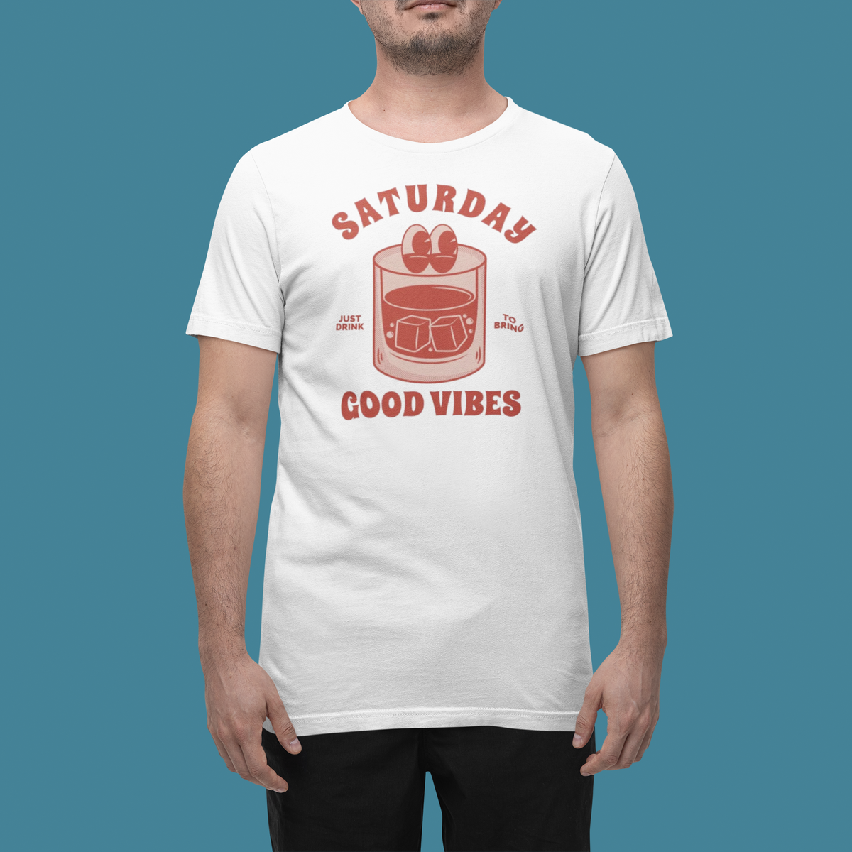 'Saturday Good Vibes' t-shirt in white, man wearing it in a studio, T-Shirt mockup, Geekpsters