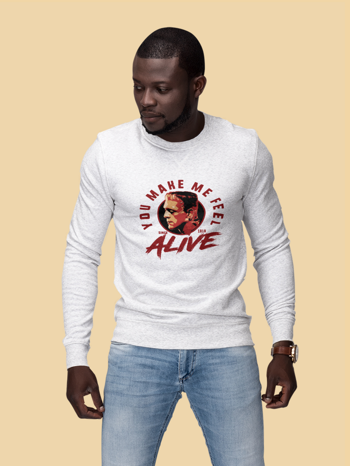 "You Make Me Feel Alive" portrait sweatshirt in white, man wearing it in studio, funny movie fan gift