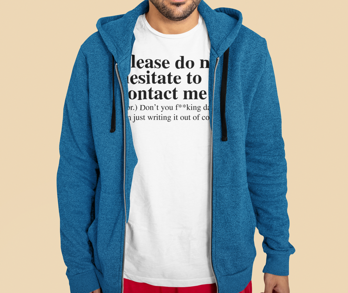 'Please Do Not Hesitate to Contact Me' T-shirt in white, man wearing blue hoodie over it, funny tee
