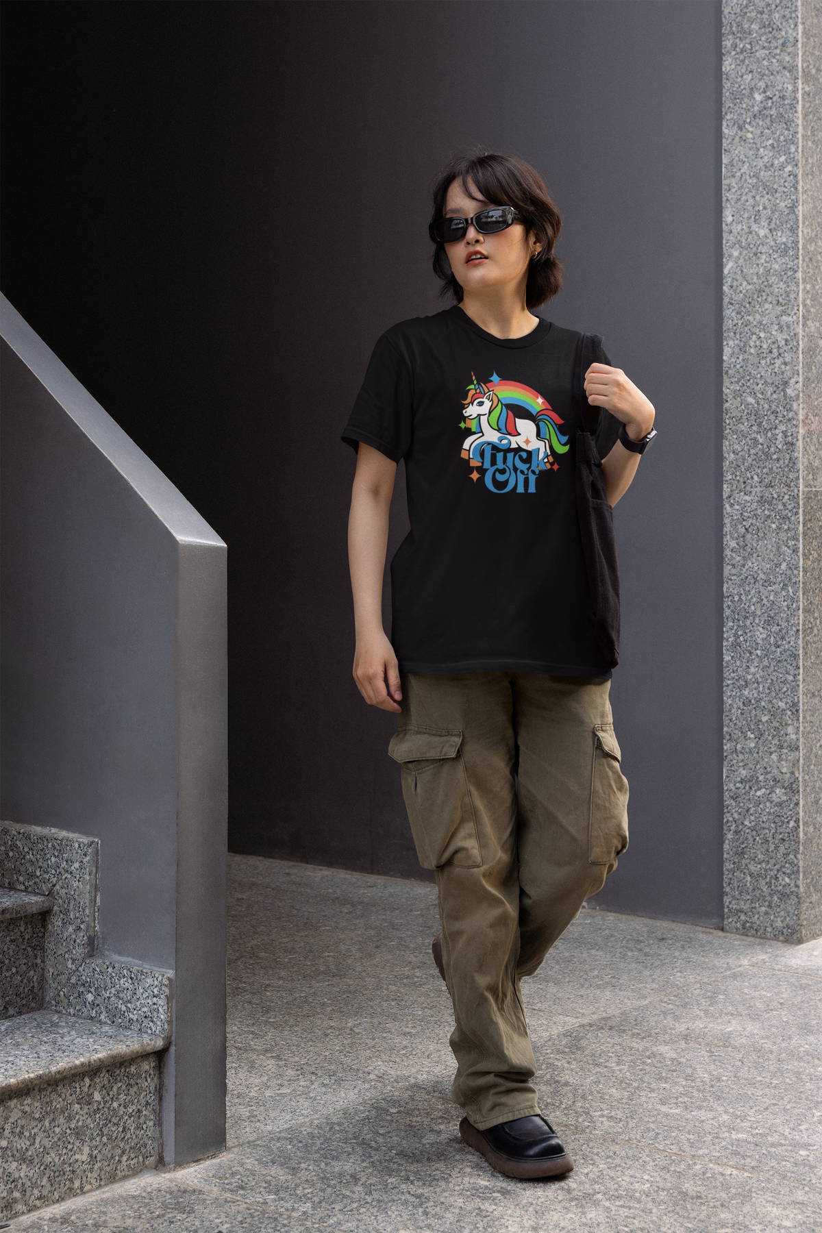 F Off Women's Tee in black, man wearing it walking outdoors, sarcastic unicorn graphic tee