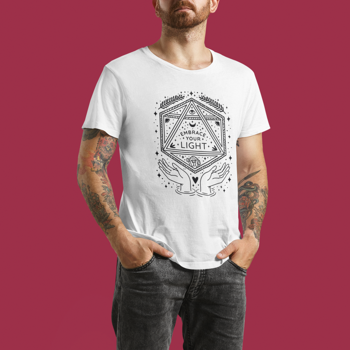 'Embrace Your Light' t-shirt in white, tattooed man wearing it