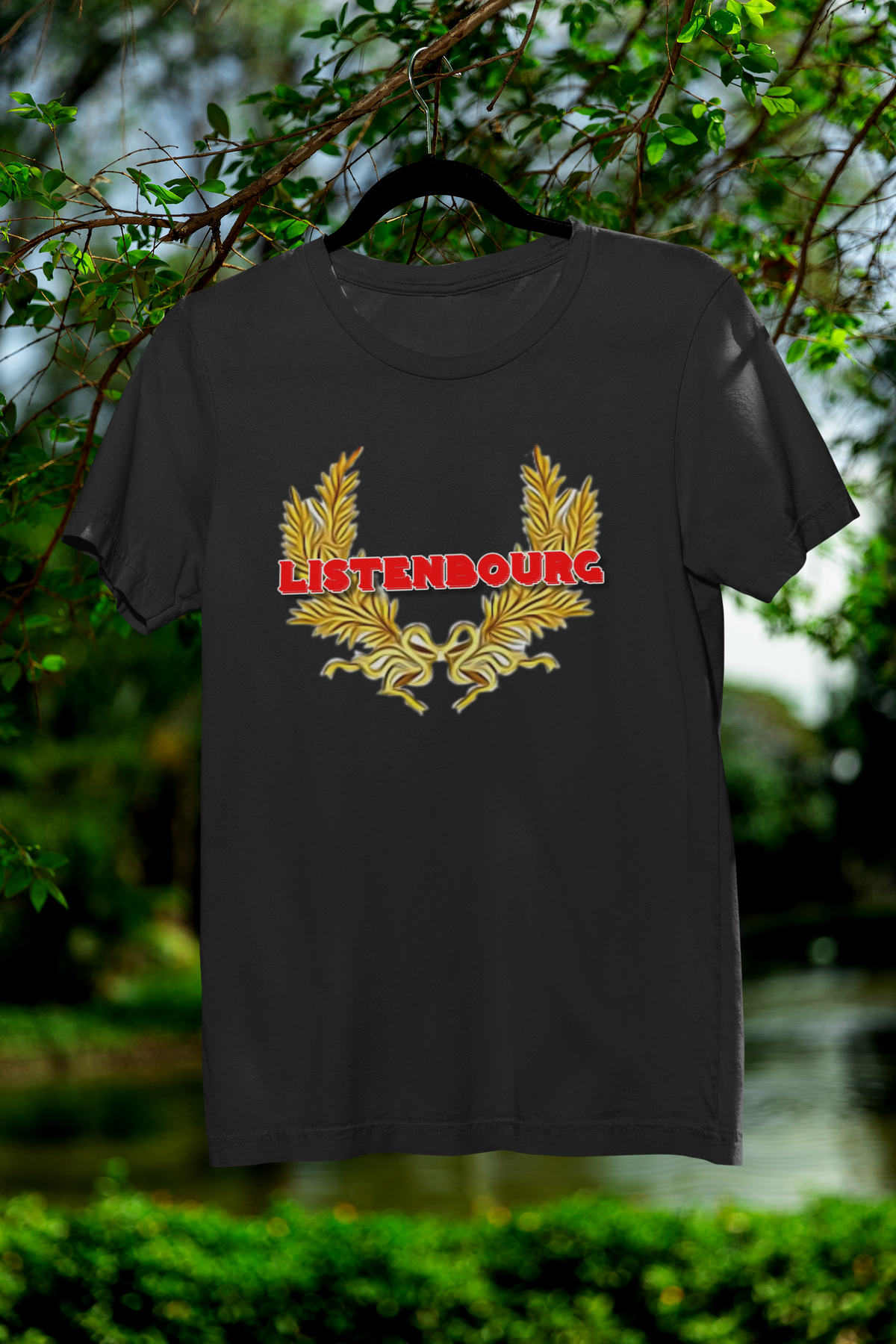 'Listenbourg' laurel wreath t-shirt in black, hanging outdoors in a garden