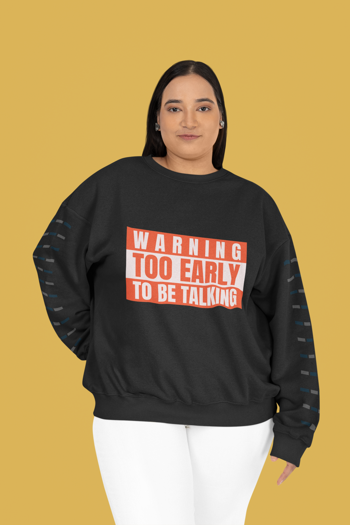 'Warning Too Early To Be Talking' sweatshirt in black, woman wearing it, yellow background, funny gift