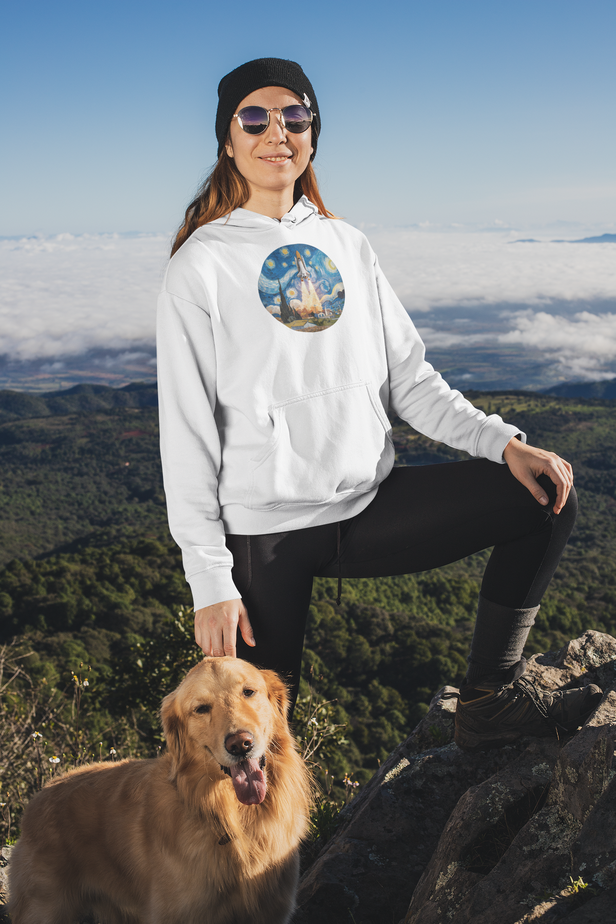Van Gogh Spaceship Hoodie in white, woman wearing it hiking outdoors with dog, mountain lifestyle space art gift