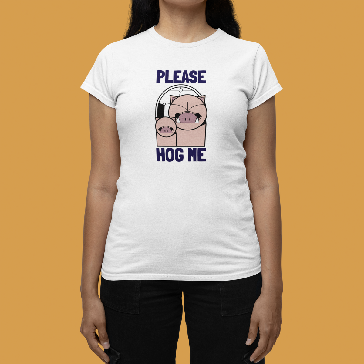 'Please Hog Me' pig graphic women's tee in white, woman wearing it, mustard backdrop, pig pun gift