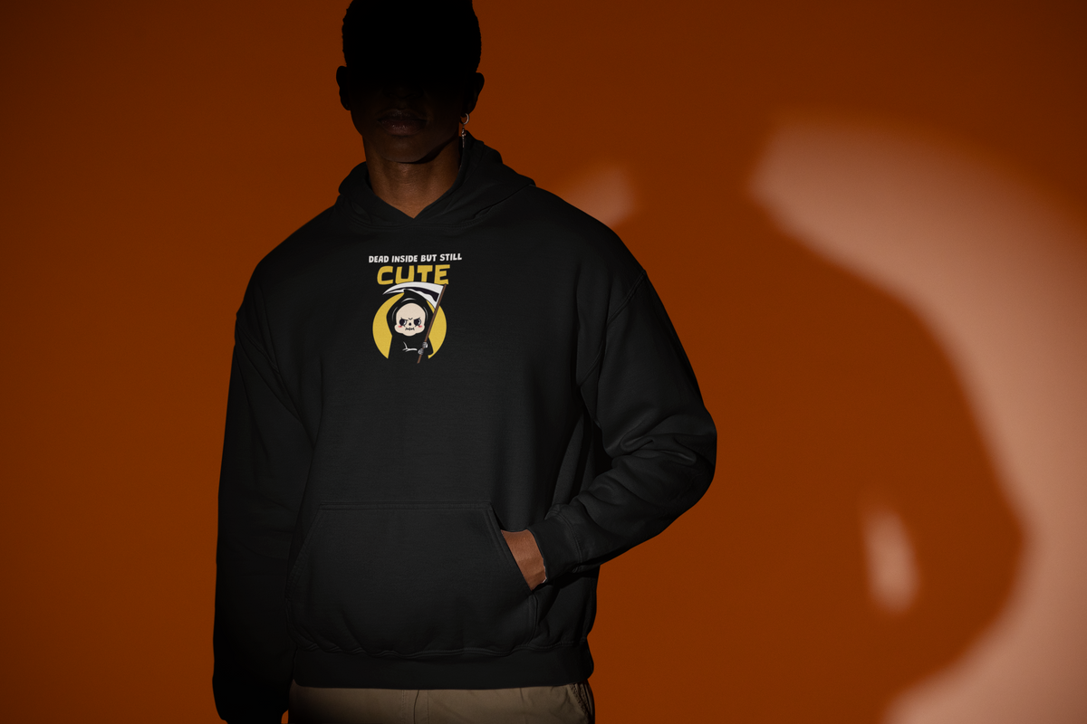 'Dead Inside but Still Cute Hoodie' in black, man under a spotlight, Hoodie mockup, Geekpsters