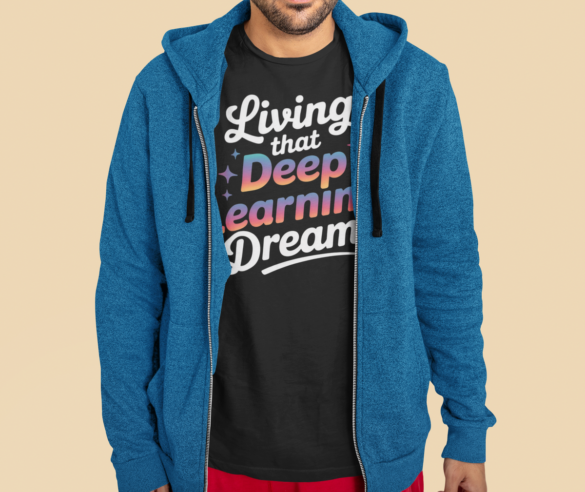 'Living that Deep Learning Dream' tee in black, man wearing it under an open hoodie, developer gift
