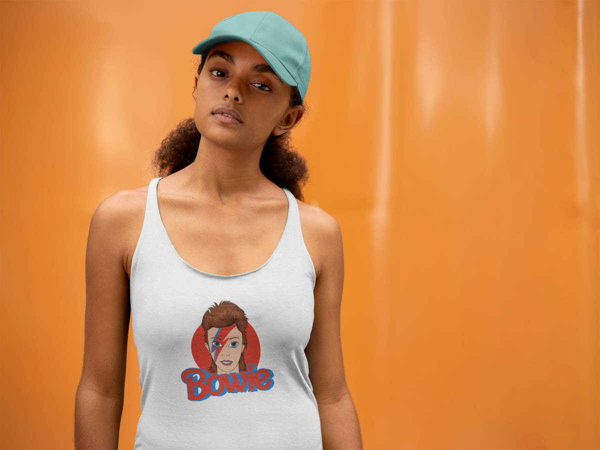 'Bowie Women's Tank' in white, woman by an orange wall, Tank Top mockup, Geekpsters