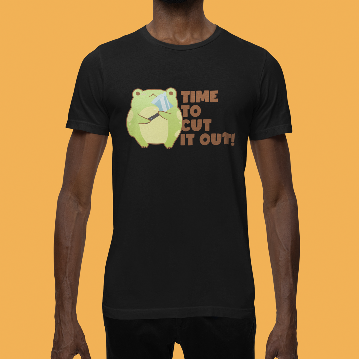 'Time to Cut It Out' frog t-shirt in black, man wearing it outdoors, funny gift for science teachers