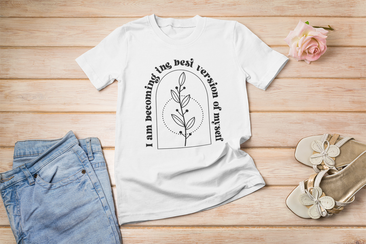 'I Am Becoming The Best Version Of Myself' t-shirt in white, flat lay lifestyle setting