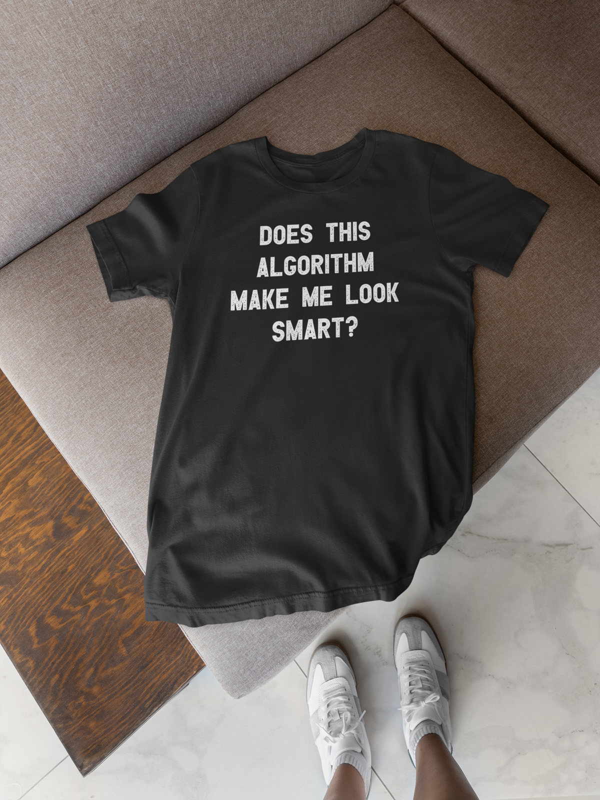 'Does This Algorithm Make Me Look Smart?' t-shirt in black, flat lay with sneakers, funny gift for programmers