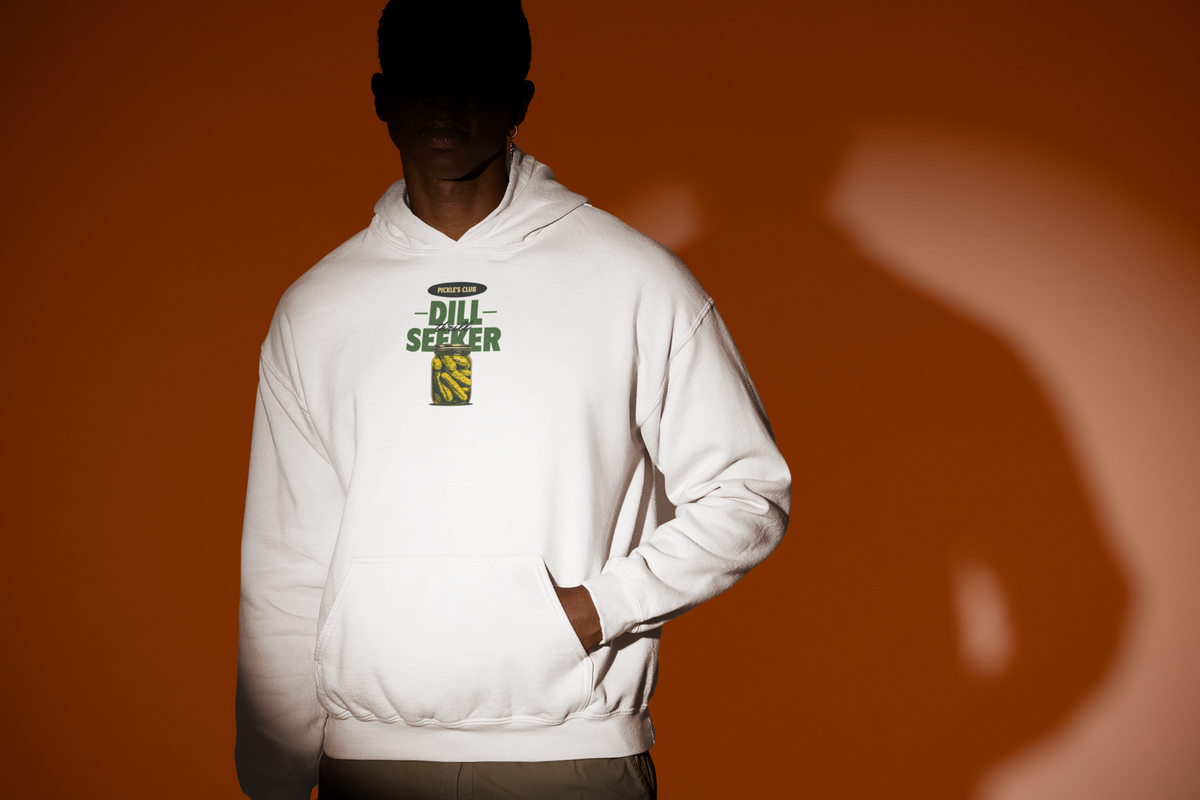 'Dill Seeker Hoodie' in white, man under a spotlight, Hoodie mockup, Geekpsters