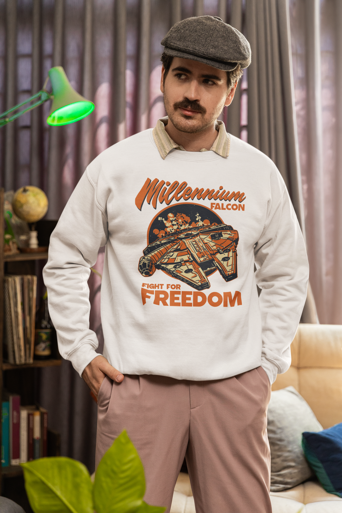 'Millennium Falcon Fight for Freedom' sweatshirt in white, man in flat cap wearing it indoors, funny geek gift idea