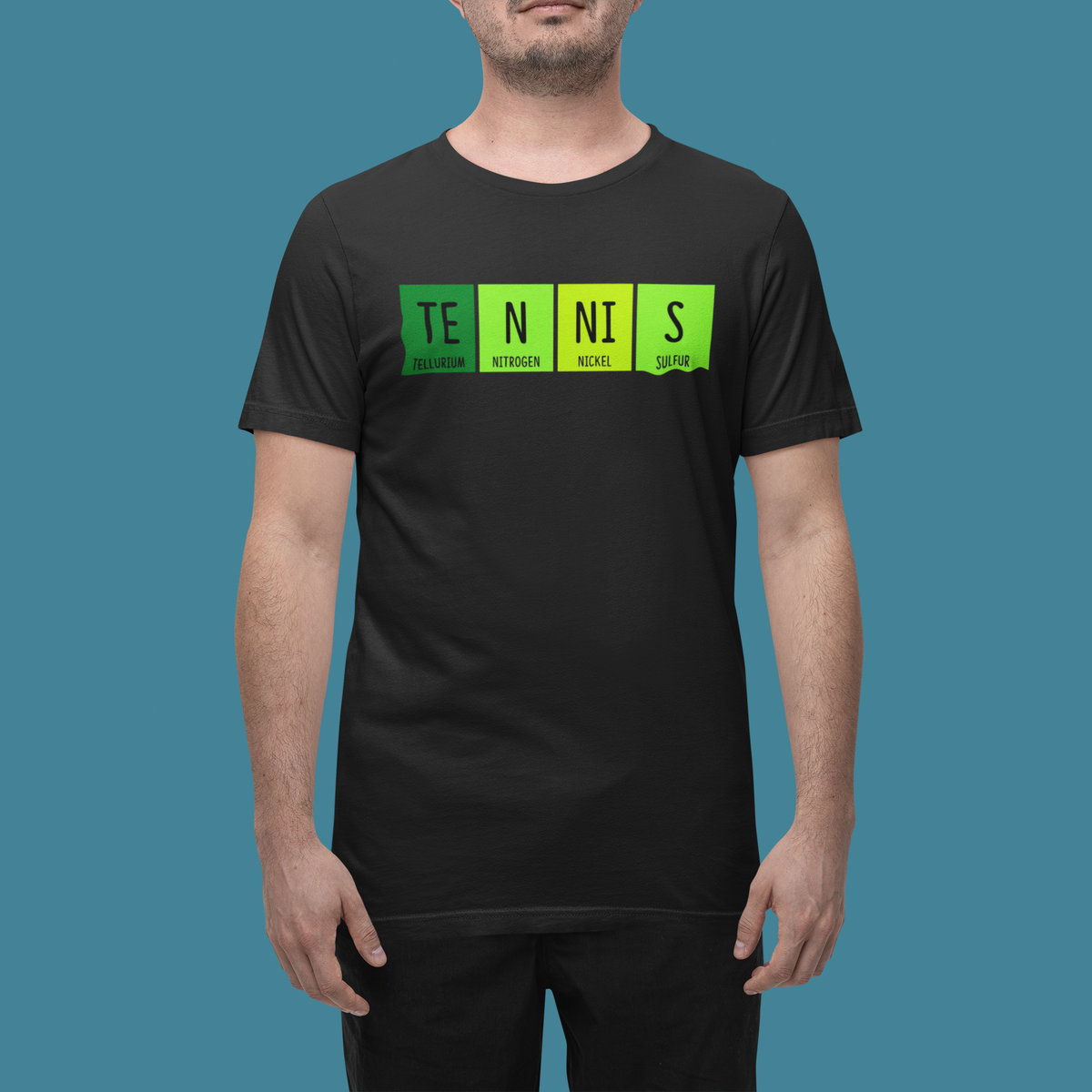 'Tennis' periodic table t-shirt in black, man wearing it against a teal backdrop, funny science tennis gift