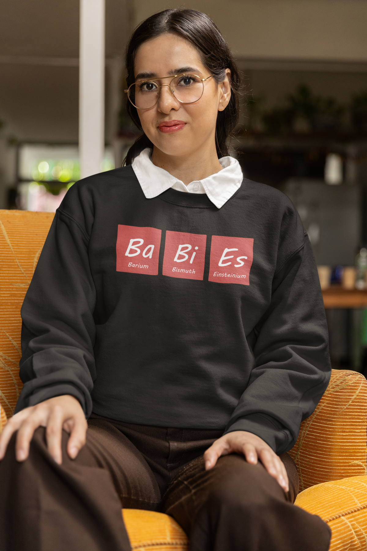 Ba-Bi-Es periodic table baby element pun crewneck sweatshirt, model wearing it in a studio shot