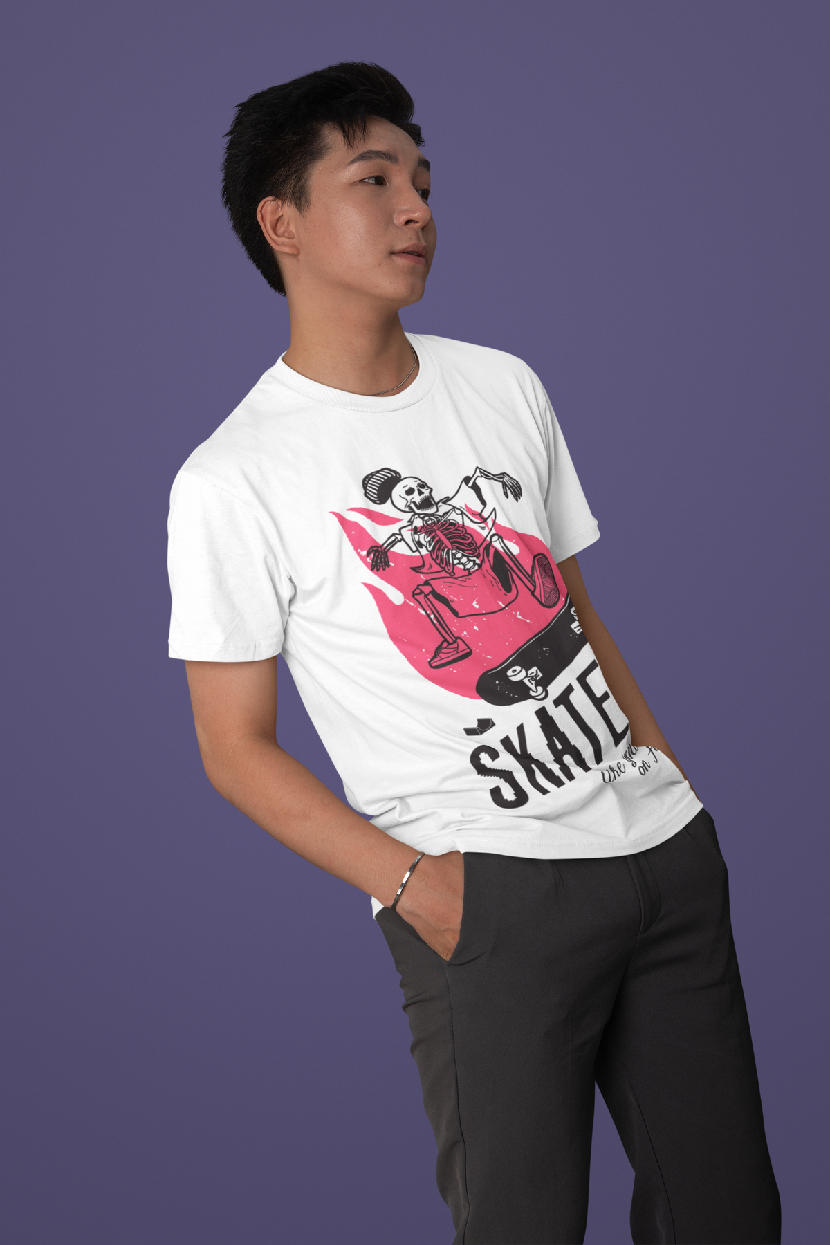 "Skeleton Skate" skateboarding t-shirt in white, man wearing it, funny gift for skaters