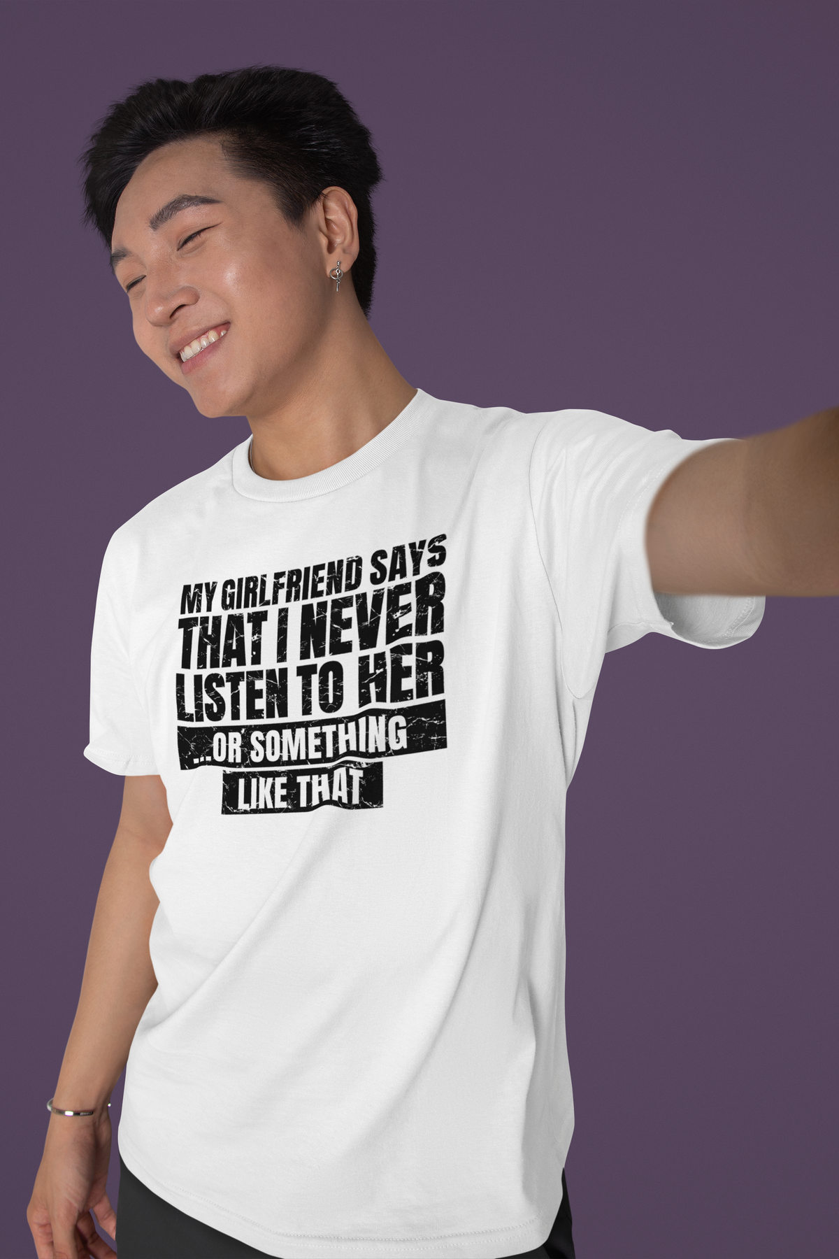 'My Girlfriend Says I Never Listen' t-shirt in white, smiling man taking a selfie