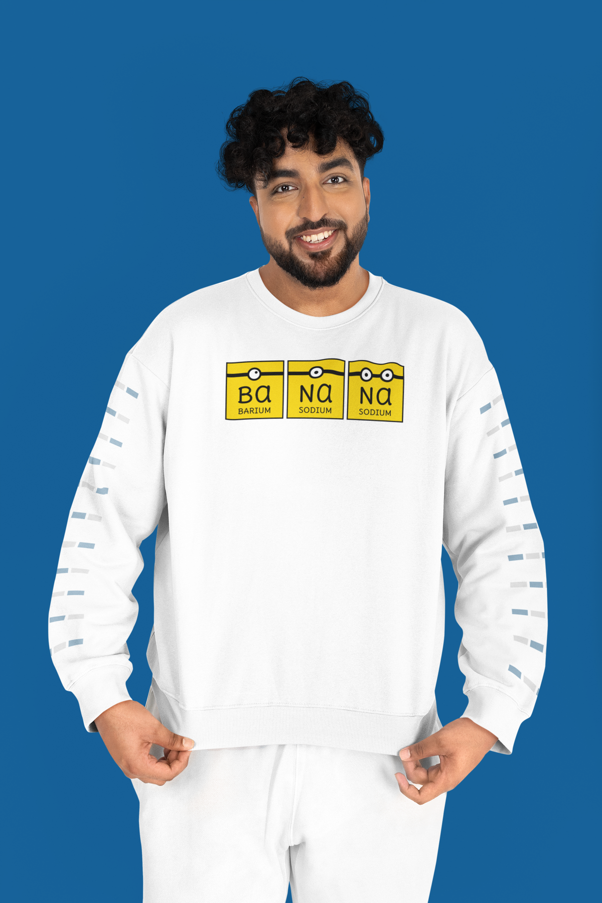 'Ba-Na-Na' crewneck sweatshirt in white, man wearing it against blue studio backdrop, funny banana pun gift