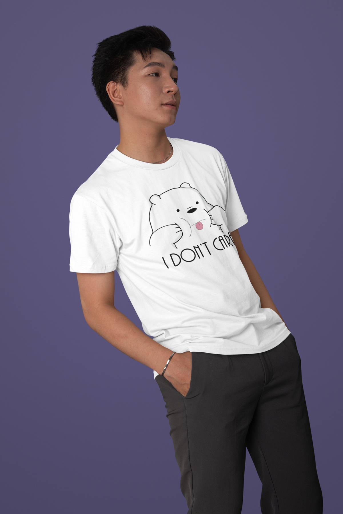 'I Don't Care' panda t-shirt in white, young man modeling it in studio, funny animal pun gift