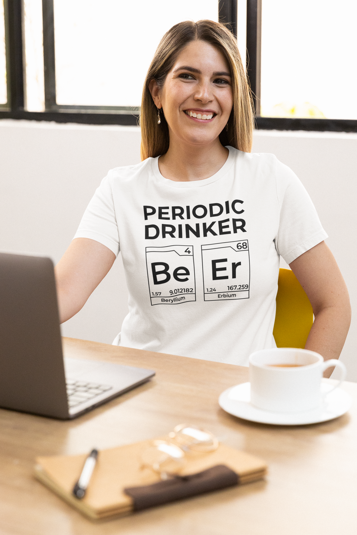 Periodic Drinker 'Beer' T-shirt in white, woman at a desk with a laptop, funny science gift