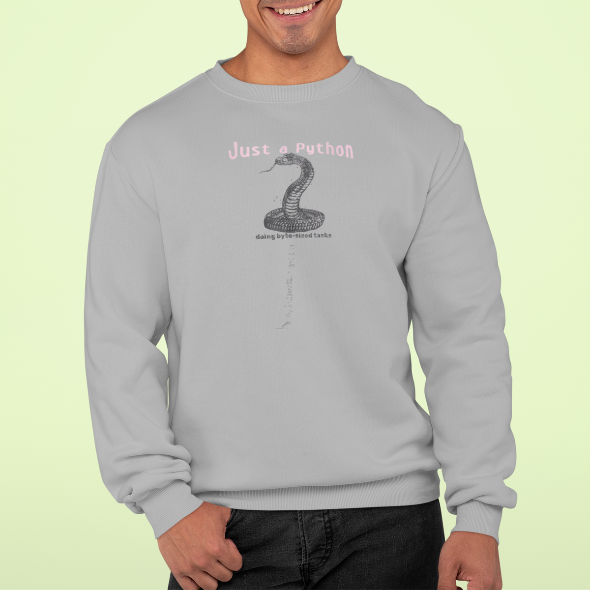 'Just a Python' sweatshirt in heather grey, man wearing it in a studio, Sweatshirt mockup, Geekpsters