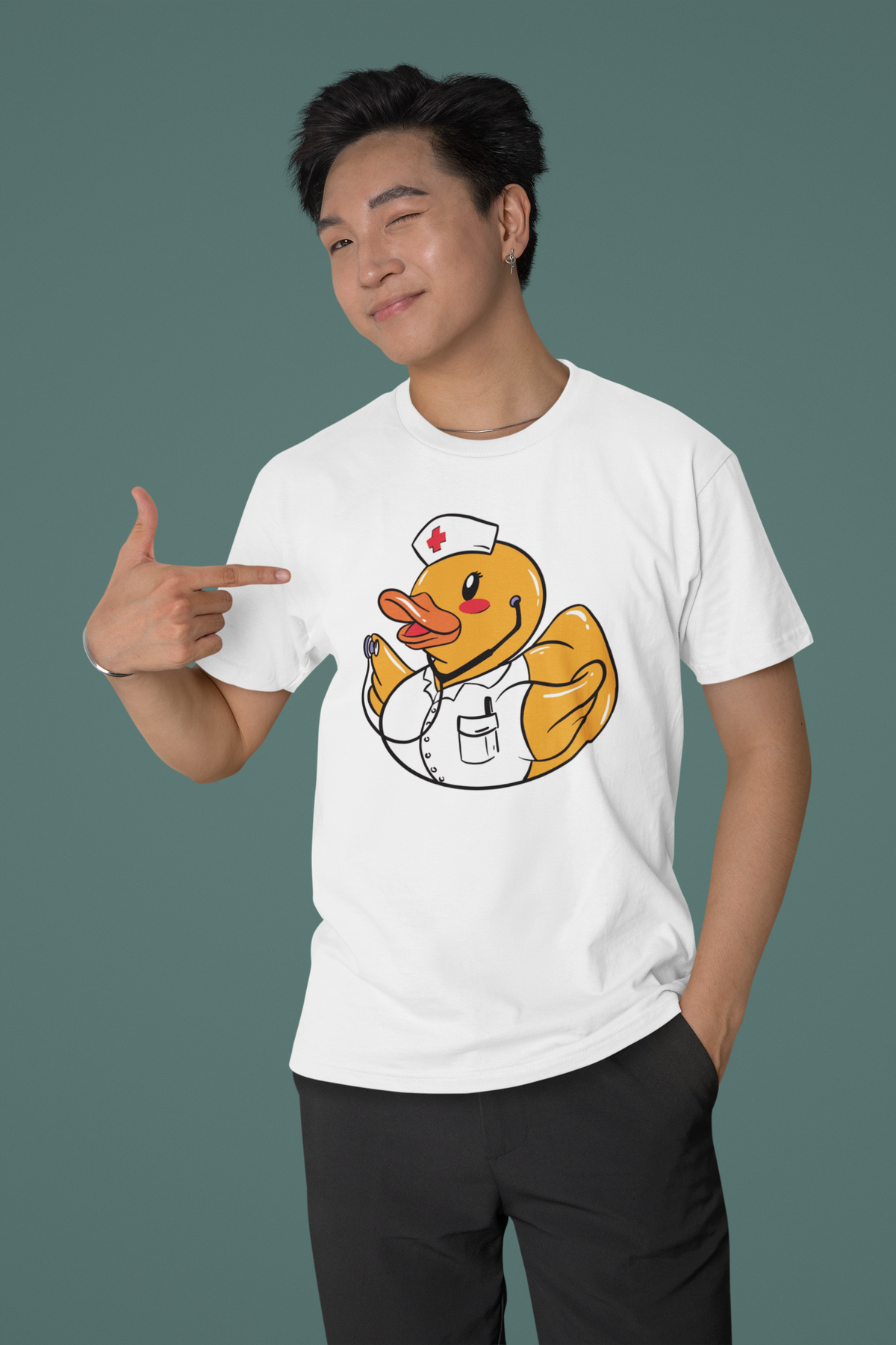 Nurse duck t-shirt in white, man model wearing it against a dark teal background, funny gift for nurses