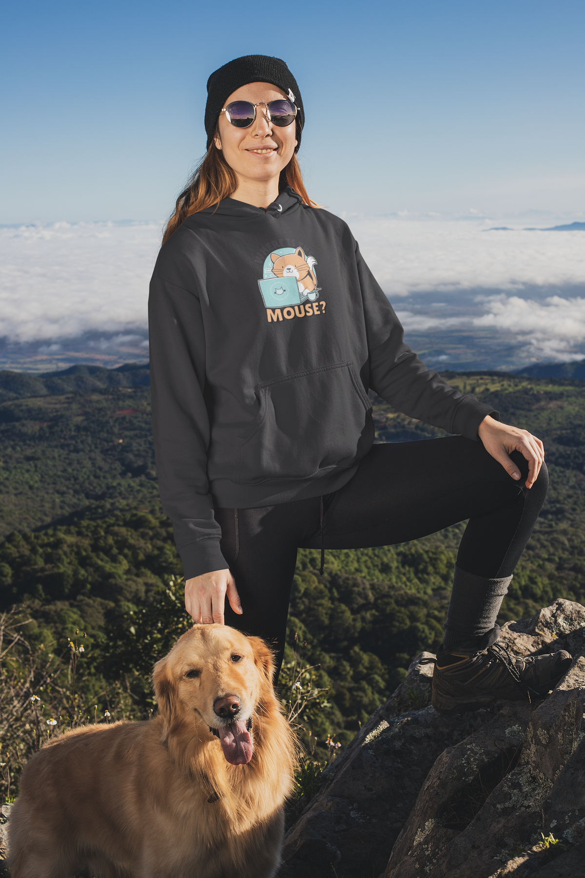 "Where Is The Mouse?" cat graphic hoodie in dark grey, woman wearing it outdoors with her dog, cat lover gift