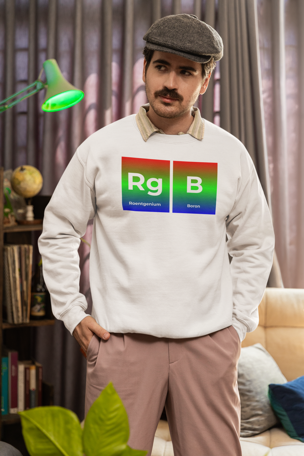 'RG-B' periodic table sweatshirt in sand, man wearing it at home, funny chemistry pun gift