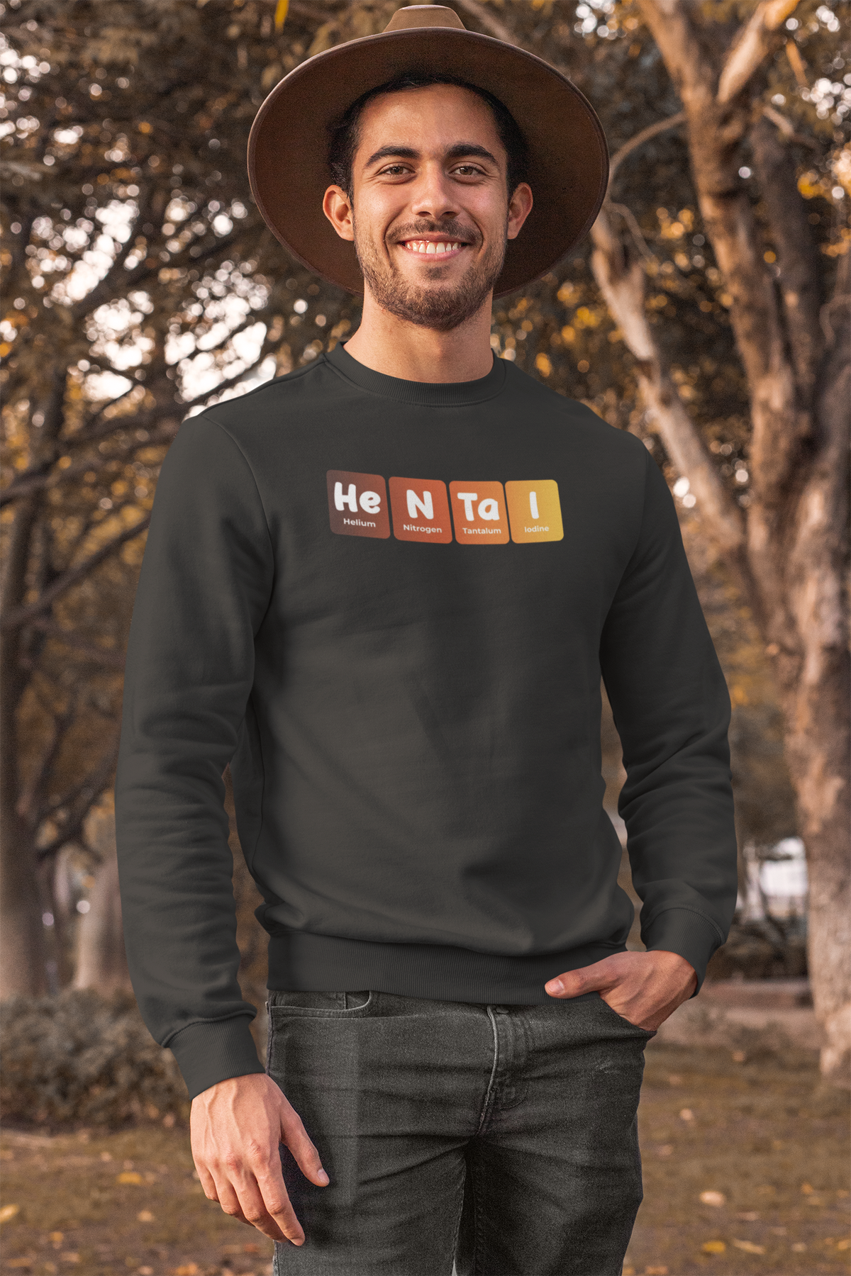 'Hentai' periodic table sweatshirt in black, man wearing it outdoors with a hat, funny anime pun gift