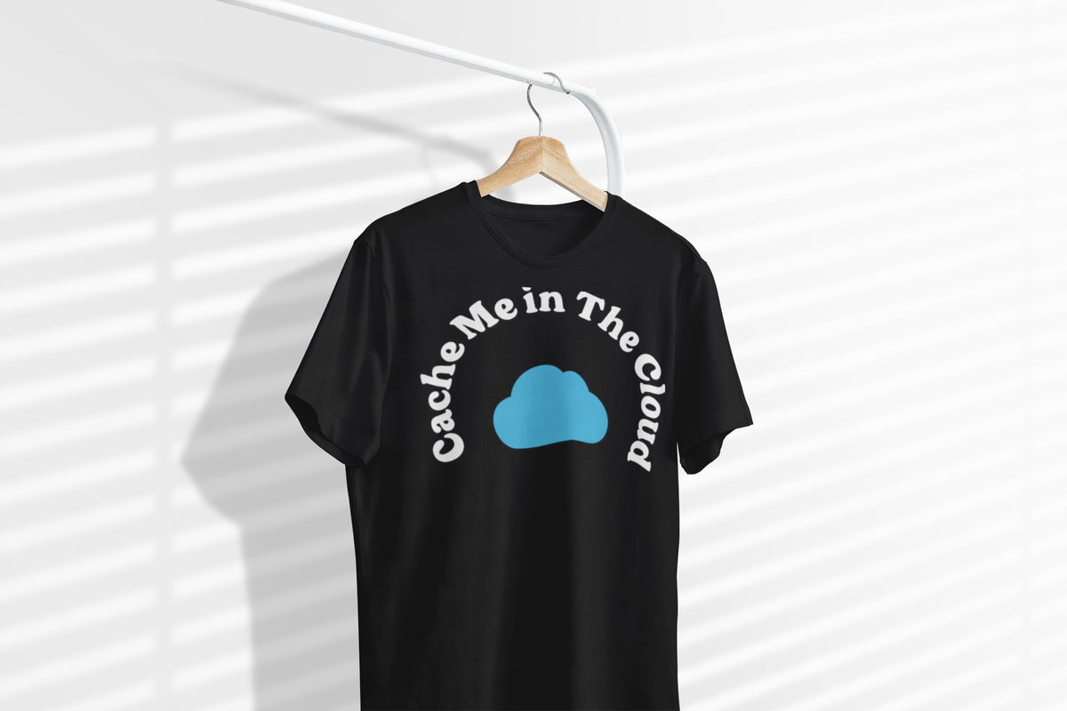 Cache Me in The Cloud tee in black, on a hanger by window blinds, funny DevOps gift shirt