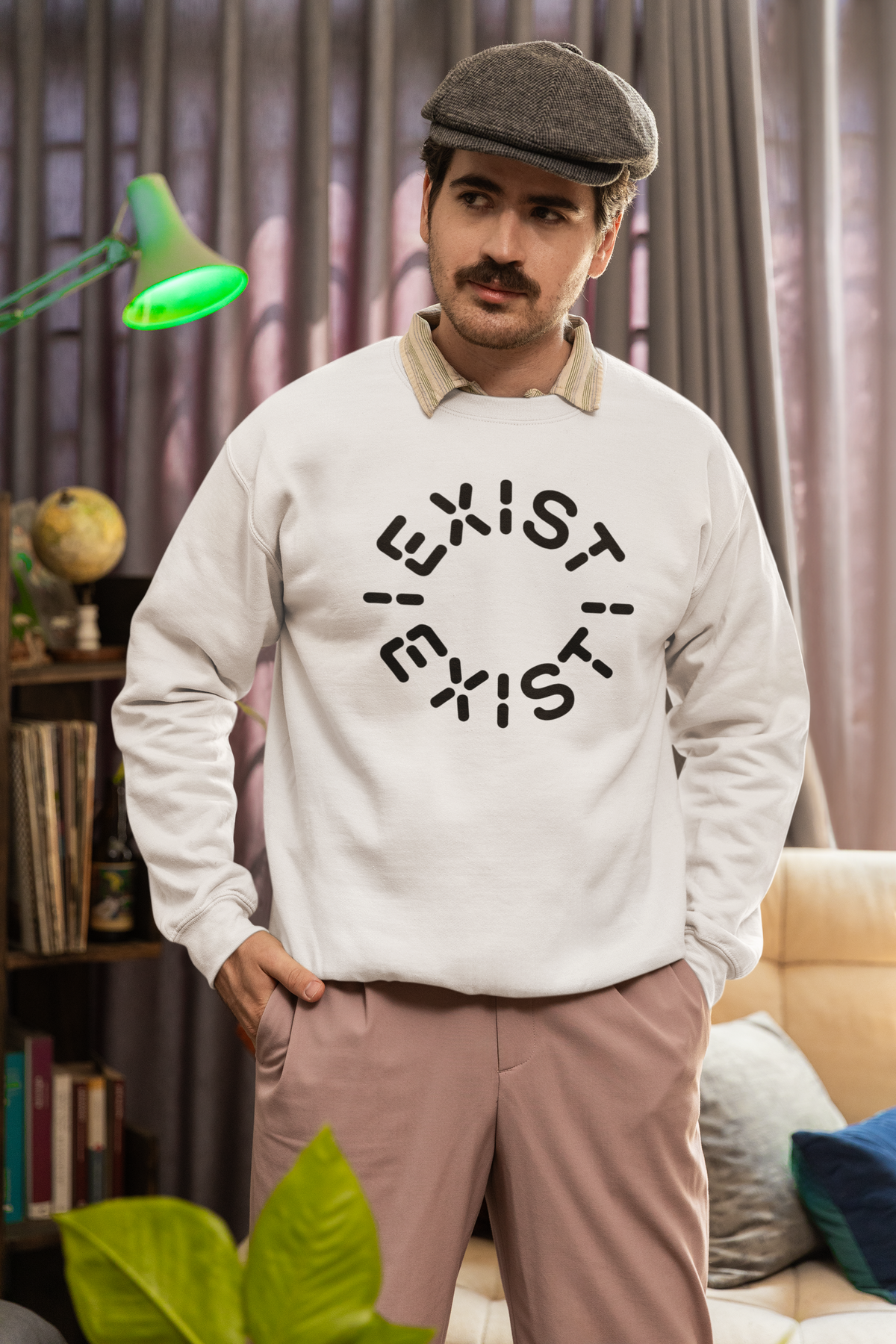 'Exist Exist' sweatshirt in white, man wearing it in cozy indoor setting, minimalist philosophy gift