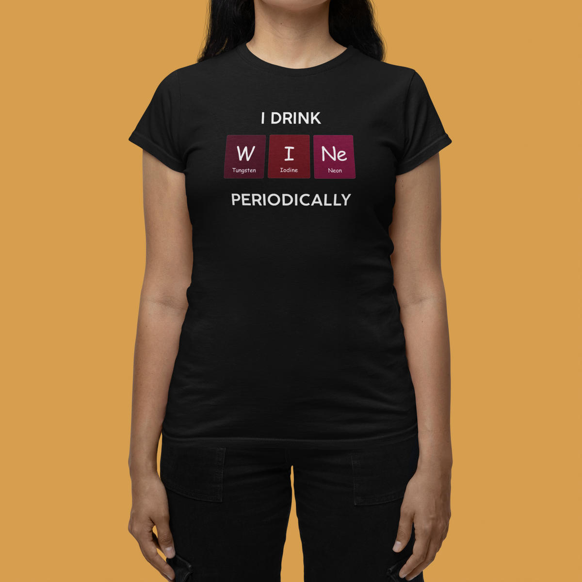'I Drink Wine Periodically' periodic table women's t-shirt in black, close-up on model, orange backdrop, wine gift