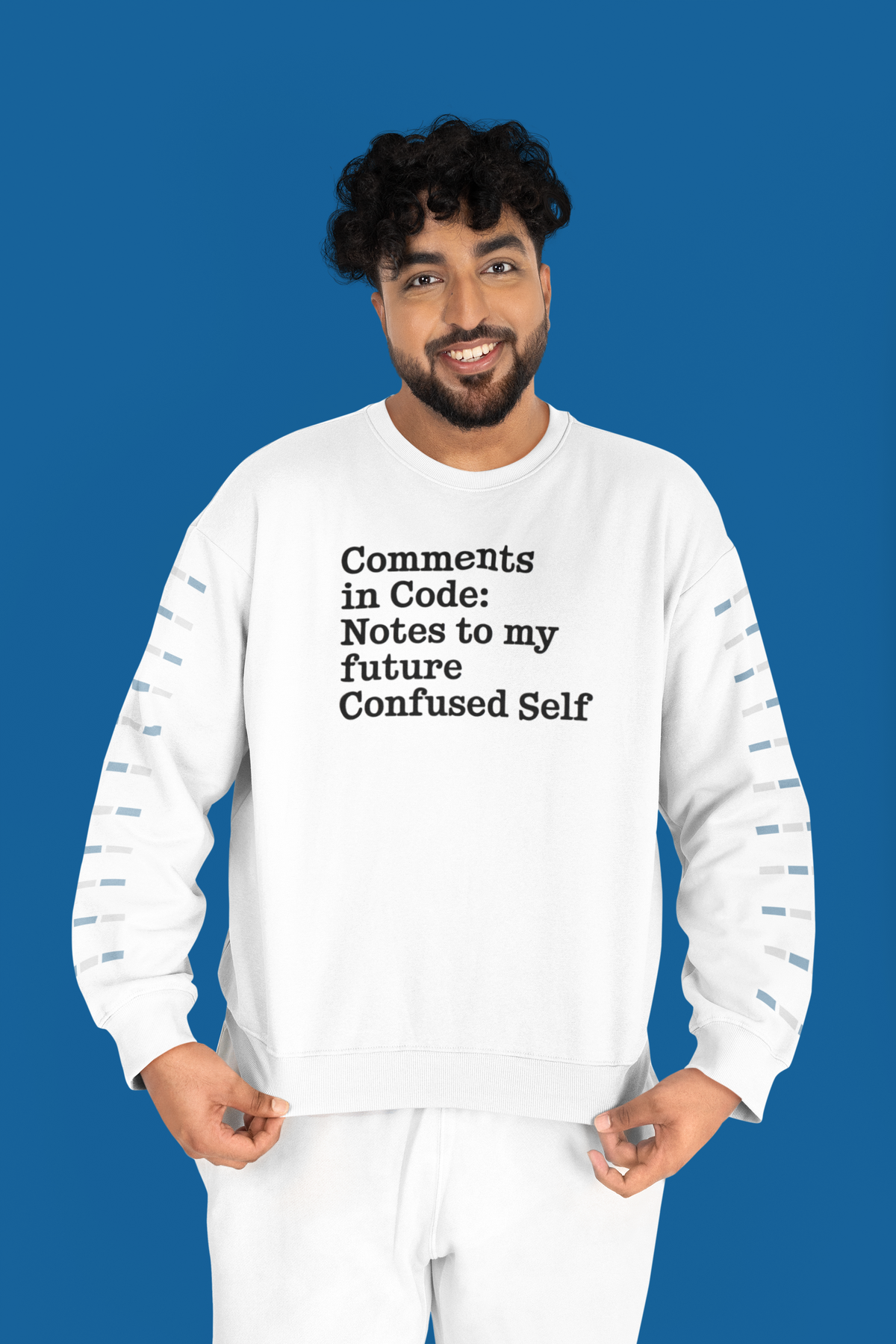 'Comments in Code' sweatshirt in white, curly haired man on blue background, funny developer gift