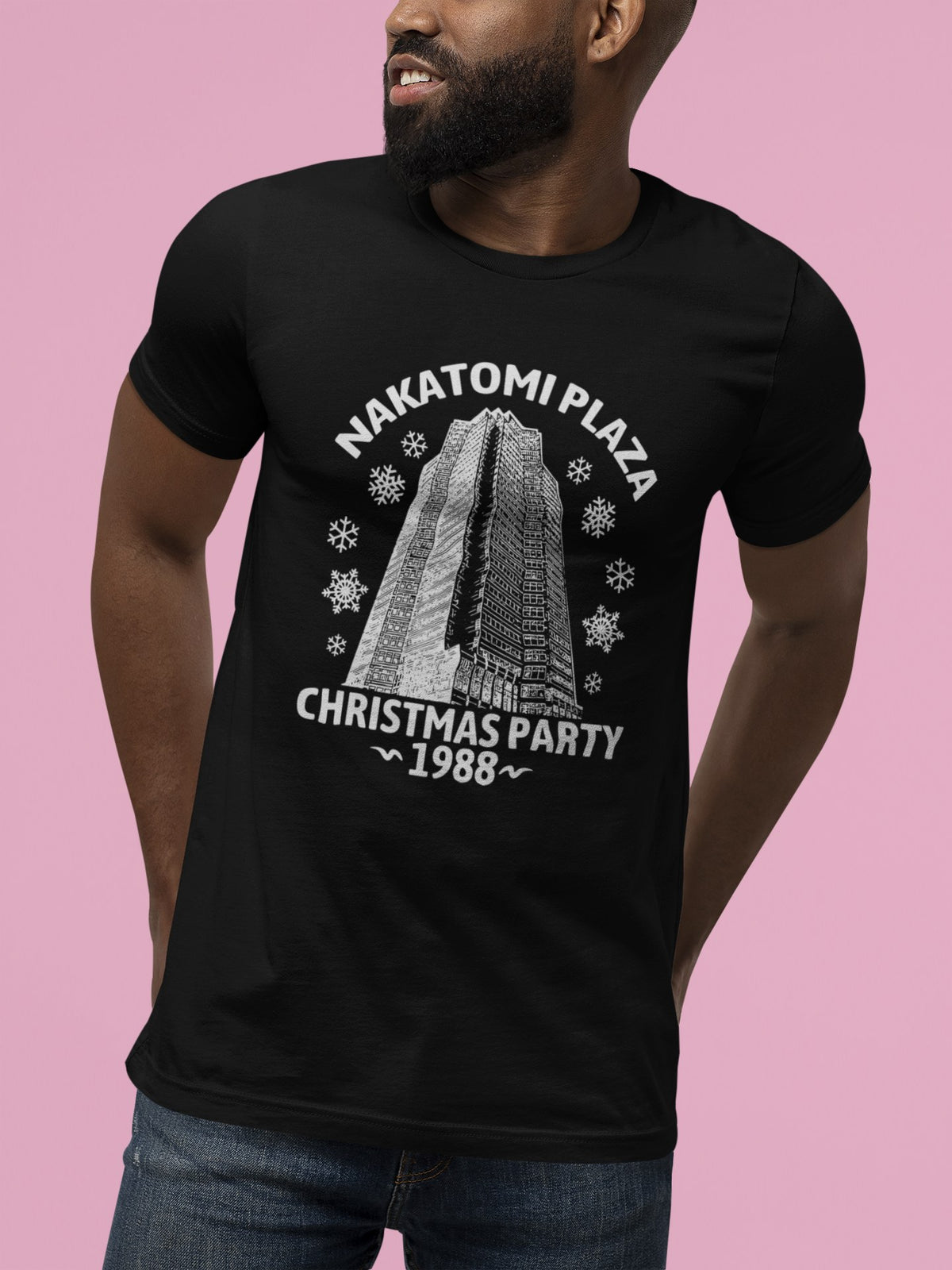 Nakatomi Plaza Christmas Party 1988 tee in black, man on a pink backdrop, movie fan gift