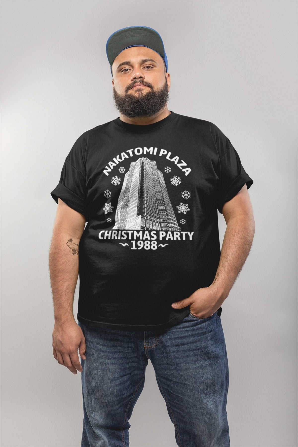 Nakatomi Plaza Christmas Party 1988 tee in black, man in jeans full length, movie fan gift