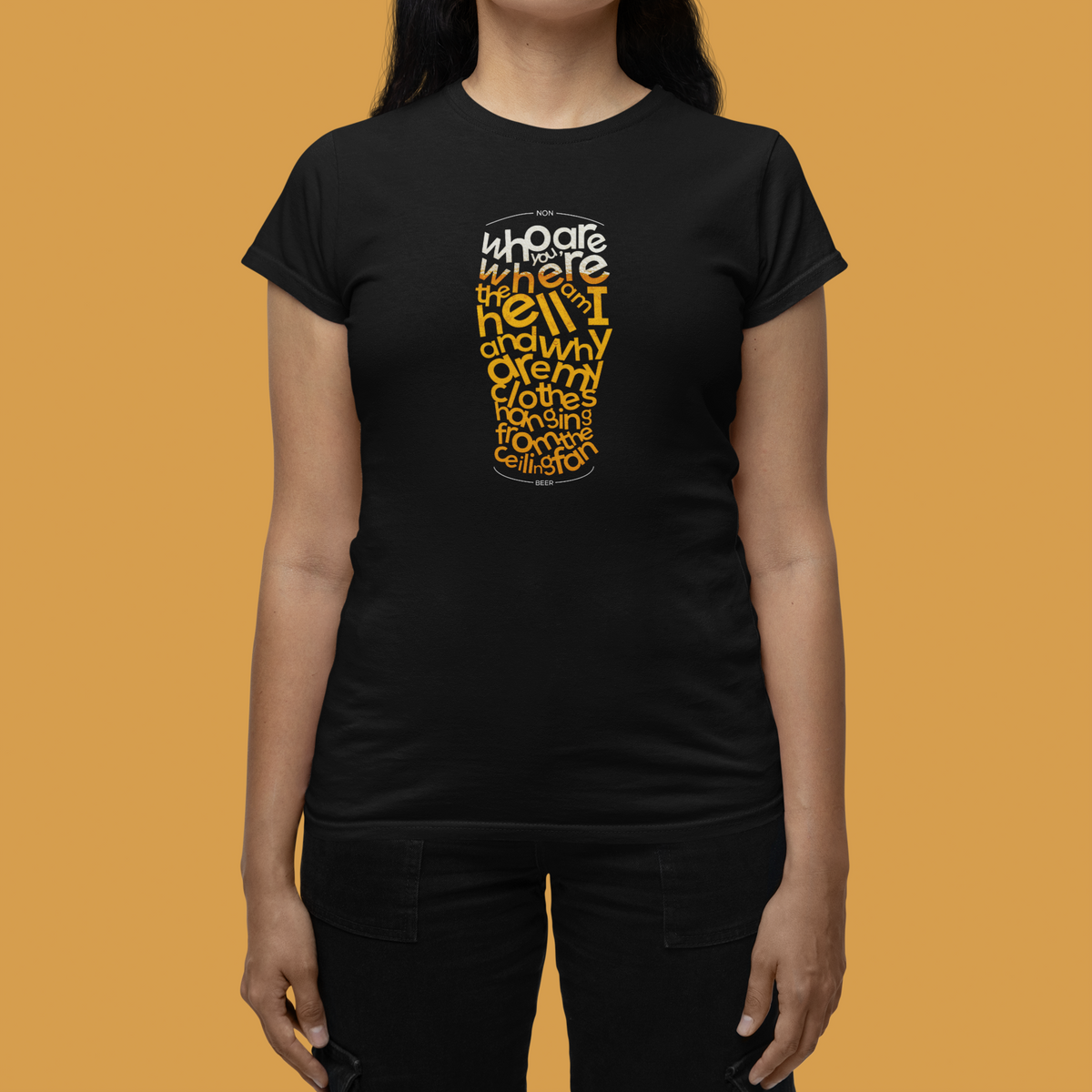 Beer Word Art Women's T-Shirt in black, woman modeling it against an orange backdrop, beer lover gift