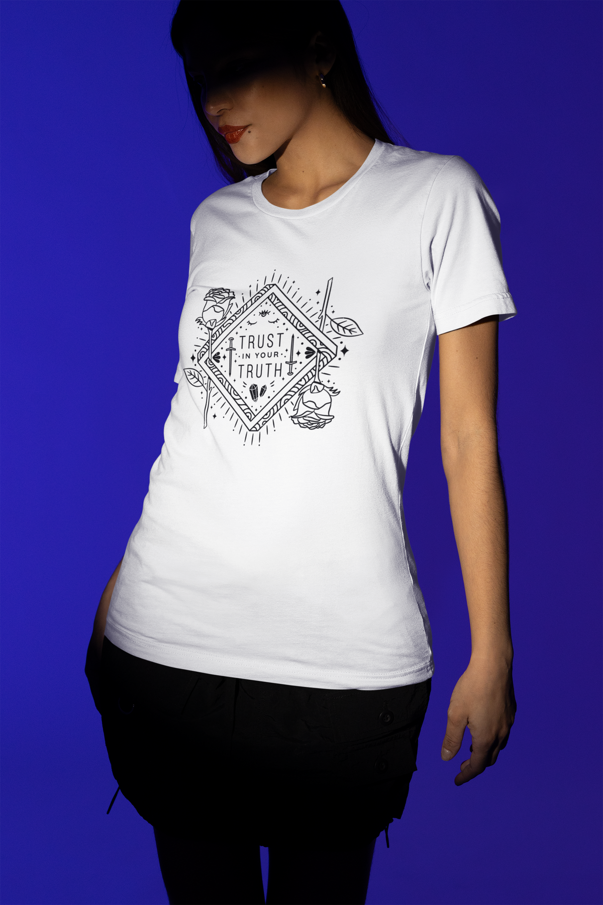 Trust in Your Truth t-shirt in white, woman model wearing it against a blue background