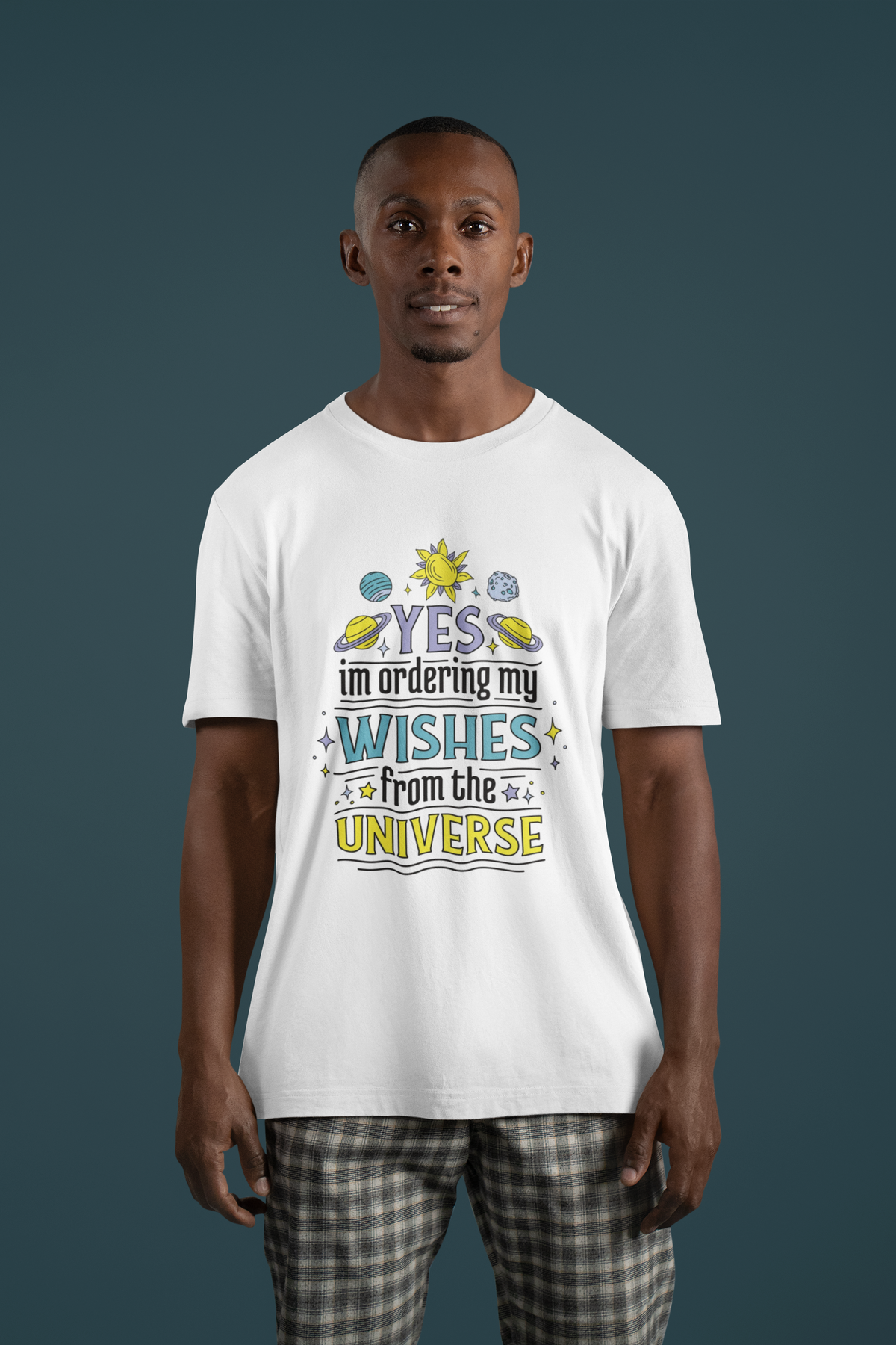'Yes I'm Ordering My Wishes' t-shirt in white, man wearing it studio shot