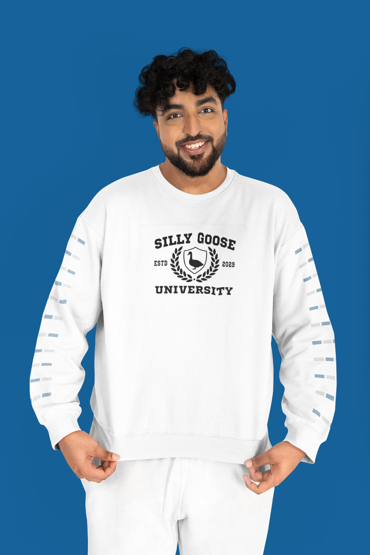 'Silly Goose University' crest Sweatshirt in white, curly haired man wearing it, funny collegiate goose gift