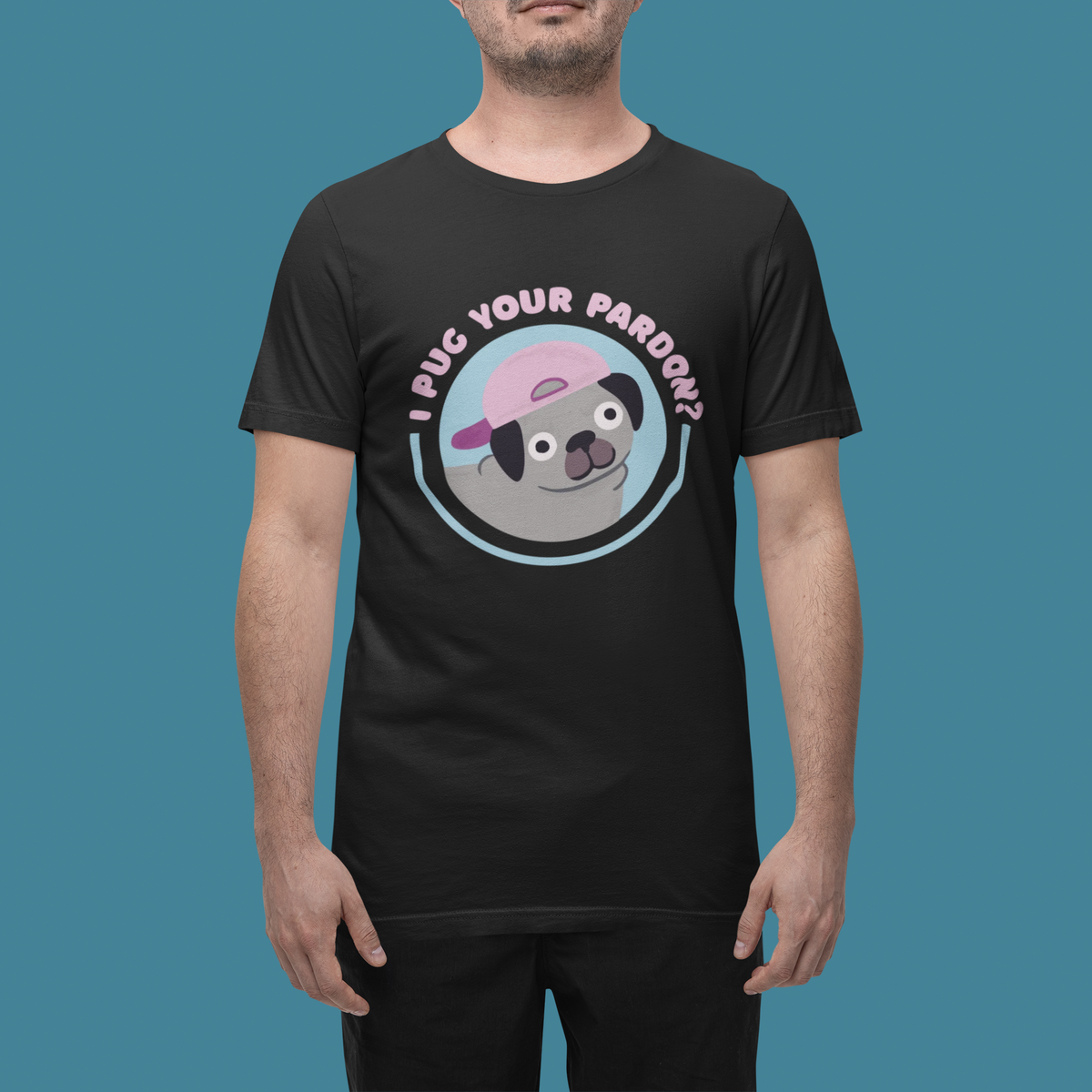 'I Pug Your Pardon' T-shirt in black, man wearing it against a teal backdrop, funny pug lover gift