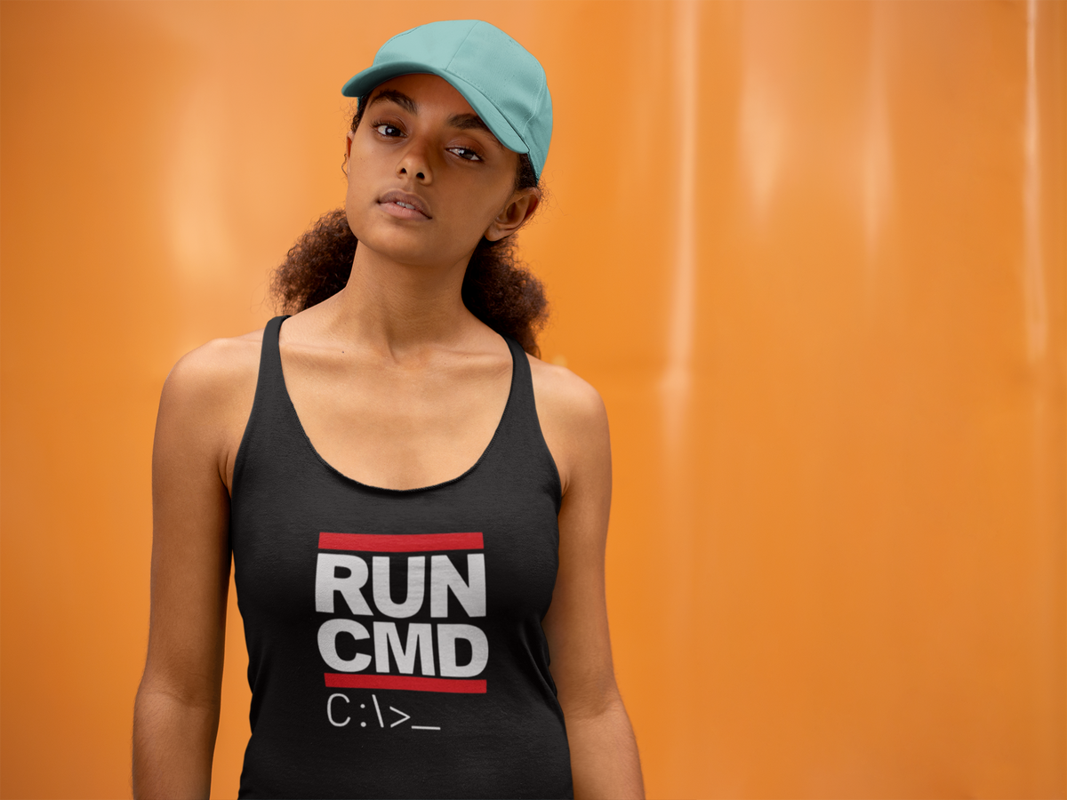 'RUN CMD Women's Tank' in black, woman by an orange wall, Tank Top mockup, Geekpsters