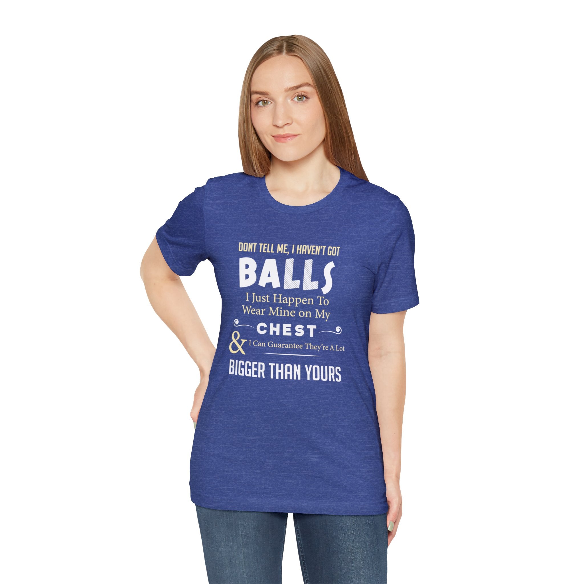 A woman wearing a Bigger Than Yours T-shirt that says, "ultimate statement piece" with the words "i want balls and i want a christ.