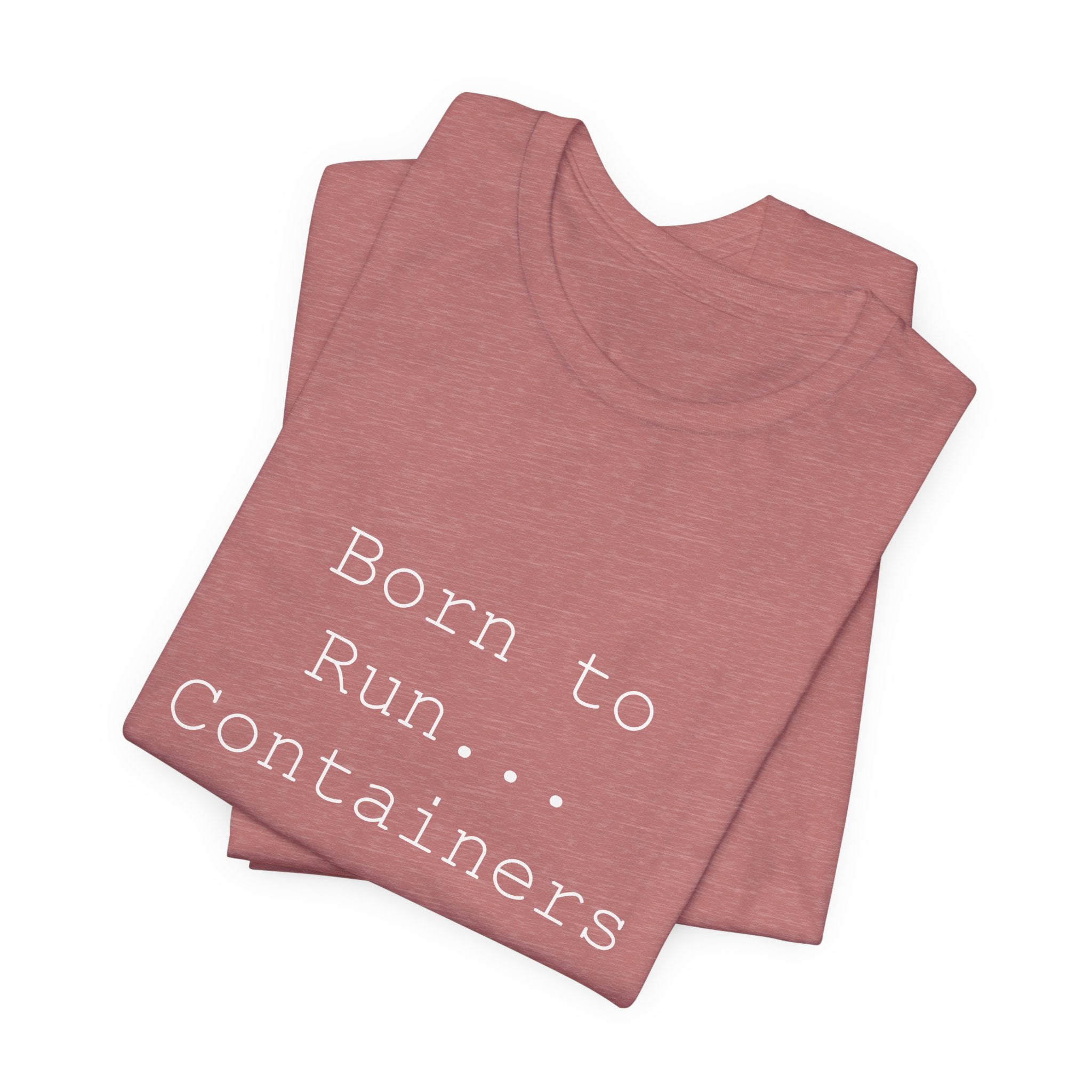 This distinctive fashion piece is a folded T-shirt in pink, showcasing the phrase "Born to Run Containers" in sharp white print, seamlessly combining comfort with style.