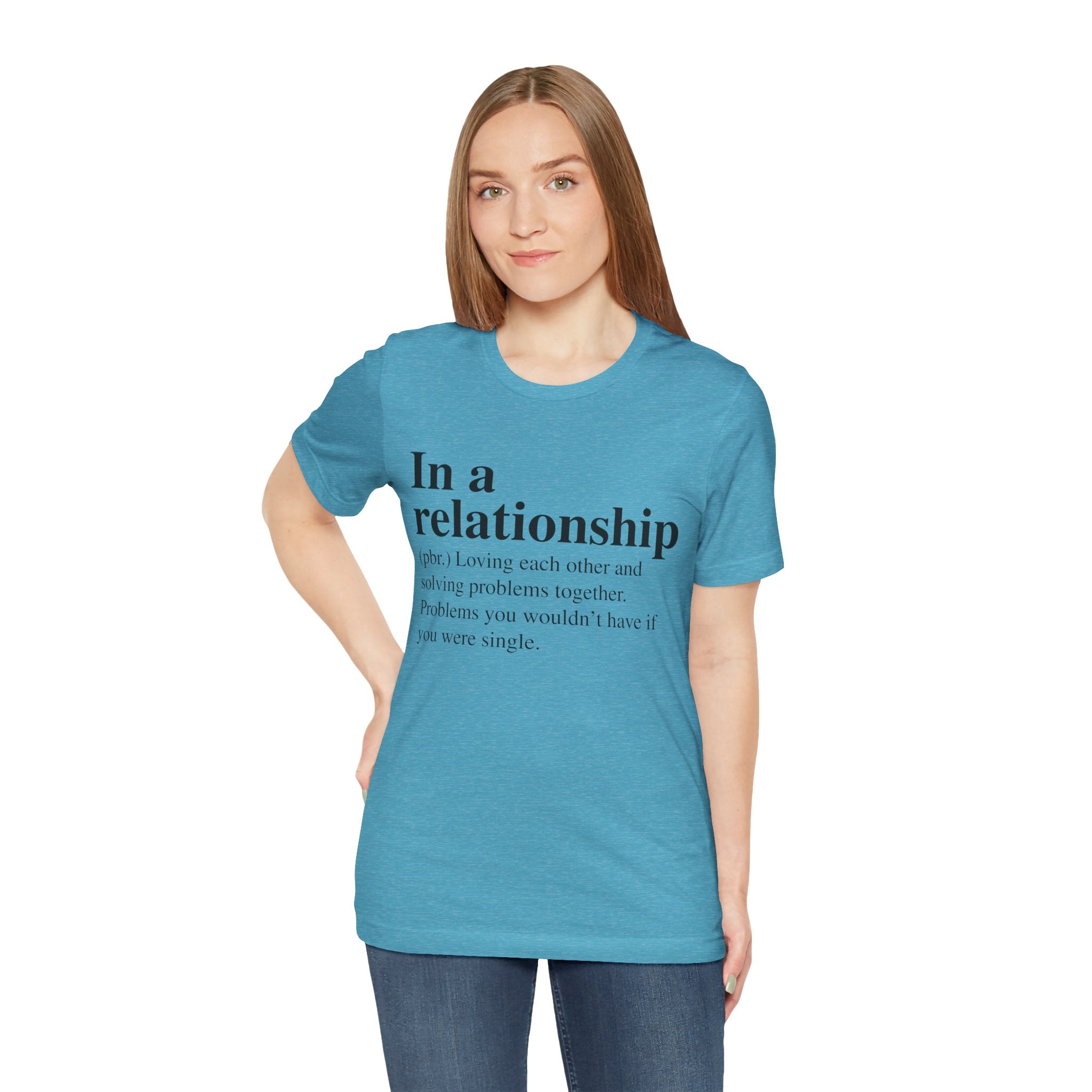 A woman in an In a Relationship T-Shirt stands against a white background.