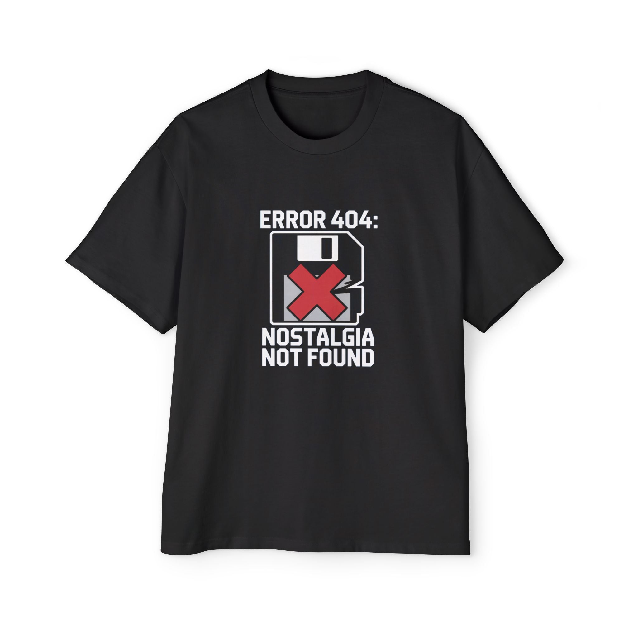 The Error 404 Nostalgia Not Found - Heavy Oversized Tee is a black, oversized cotton shirt with a floppy disk graphic, red X, and “ERROR 404: NOSTALGIA NOT FOUND” on the front—perfect for tech fans and retro lovers.