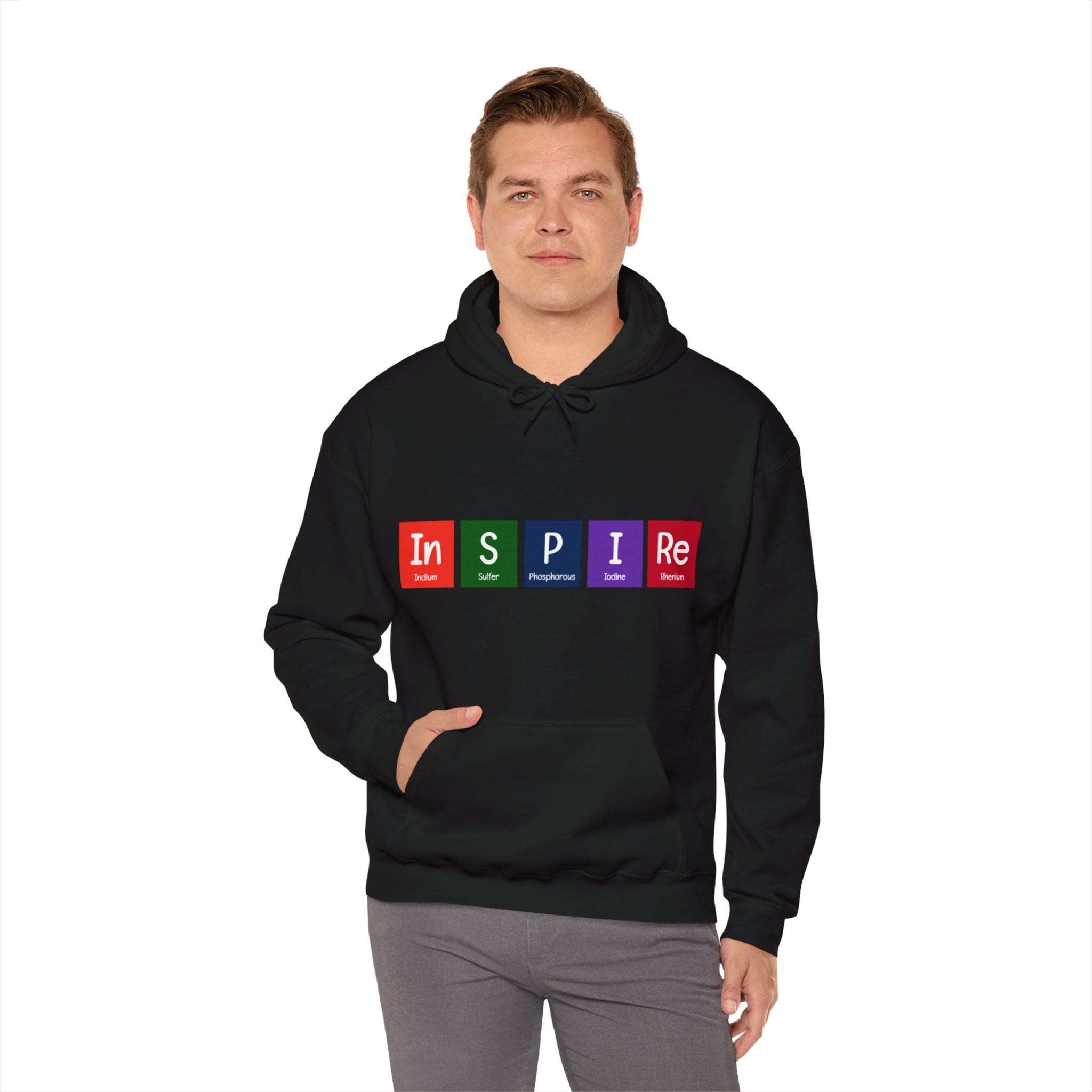 A person wearing an In-S-P-I-Re Hooded Sweatshirt made of comfortable cotton with the word "INSPIRE" printed in colorful blocks stands against a plain white background, showcasing perfect daily wear.