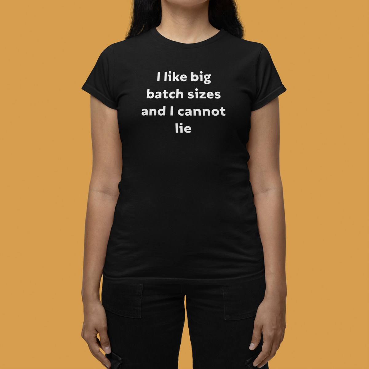 I Like Big Batch Sizes women's tee in black, close-up on woman wearing it, orange background, funny gift