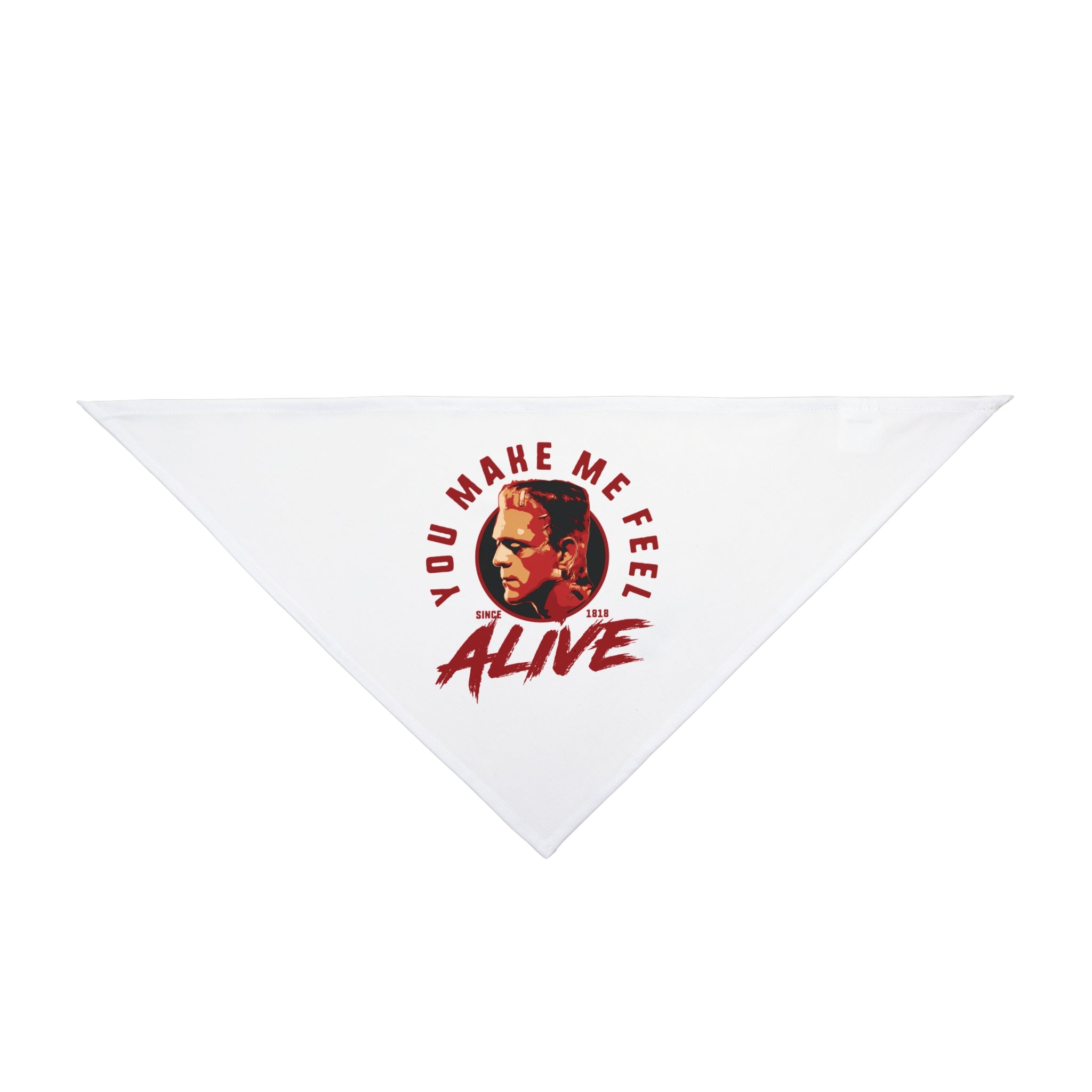 The Alive-Pet Bandana, designed in a white triangular shape, prominently showcases a graphic of a person's face encircled by the text "YOU MAKE ME FEEL ALIVE" in striking red. Crafted from soft-spun polyester, this bandana promises both comfort and style for your pet.