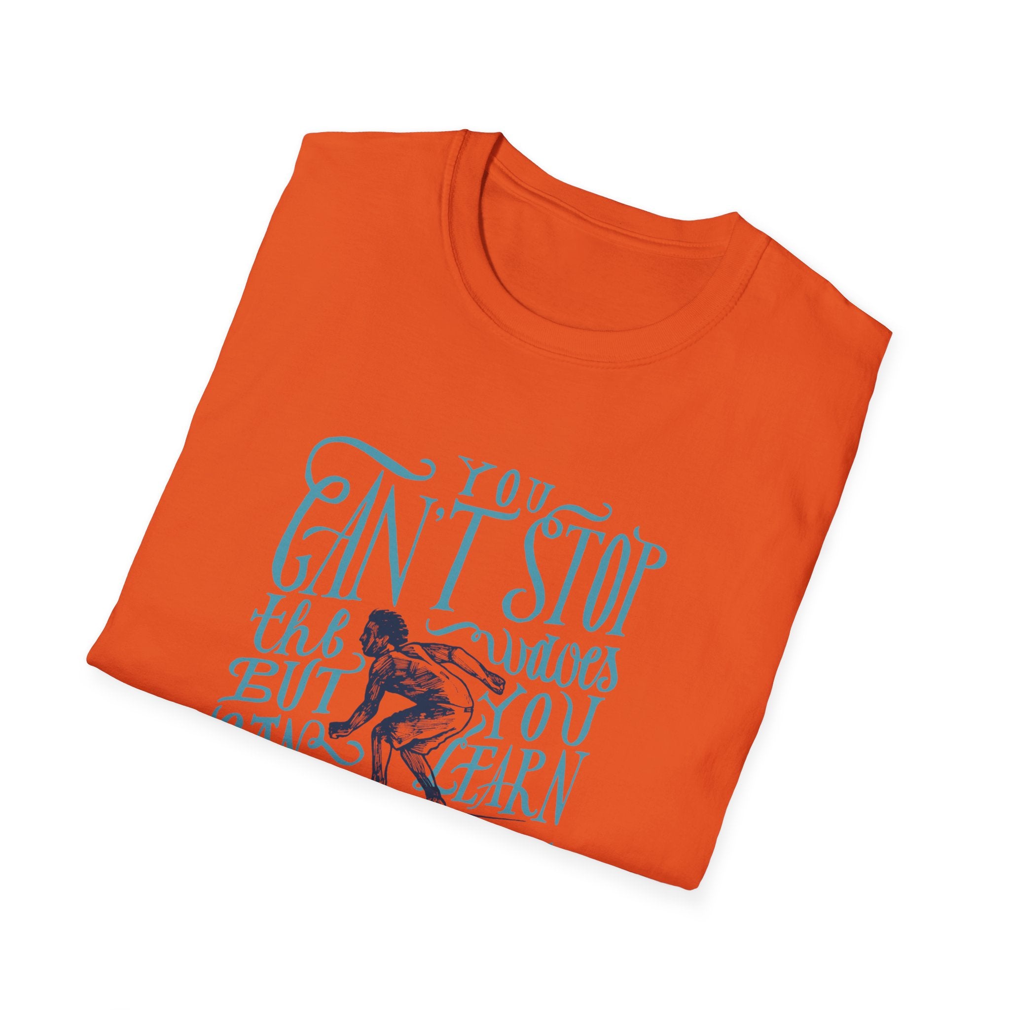 The Can't Stop Surfing T-Shirt is an orange tee featuring a vintage-inspired surfer graphic along with the inspirational text, "You can't stop the waves but you can learn to surf," ideal for anyone who embraces the surfing spirit.