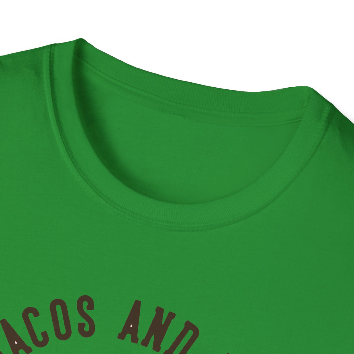 Close-up of 'Feed Me Tacos and Tell Me I'm Pretty' t-shirt text in green, funny taco graphic tee